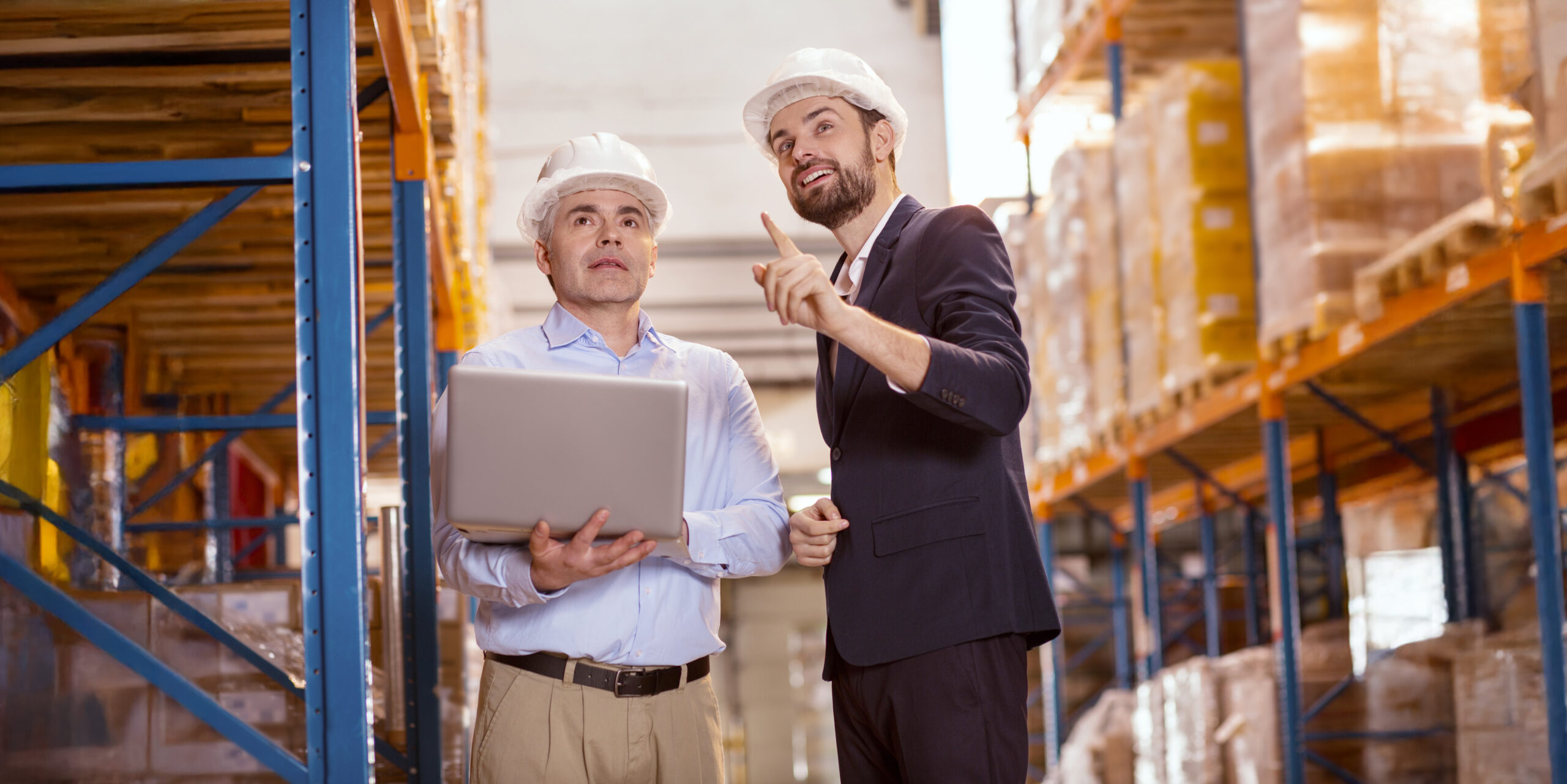 Business innovation. Positive delighted businessman talking to his manager while suggesting some ideas